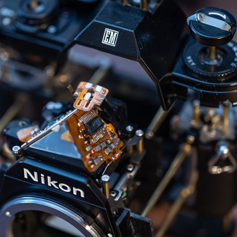 Disassembled Mechanical Film Camera Nikon EM