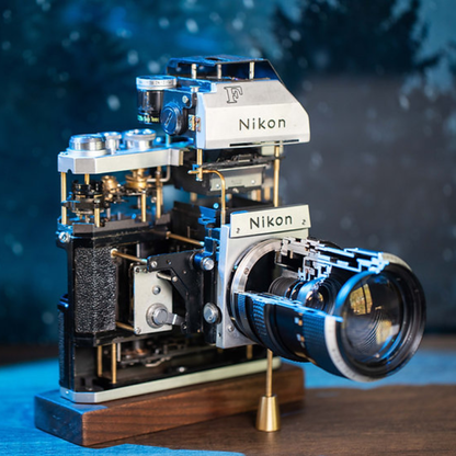Disassembled Mechanical Film Camera Nikon F With cut lens