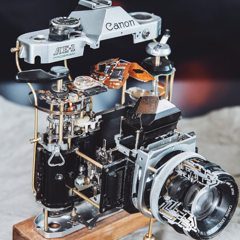 Disassembled Mechanical Film Canon AE-1 Camera , Home Decor, Camera Art