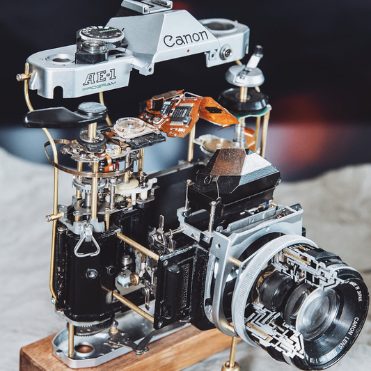 Disassembled Mechanical Film Canon AE-1 Camera , Home Decor, Camera Art