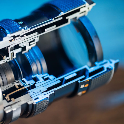 Disassembled Mechanical Film Camera Nikon F With cut lens