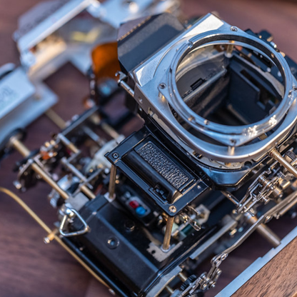 Disassembled Mechanical Film Canon AE-1 Camera , Home Decor, Camera Art