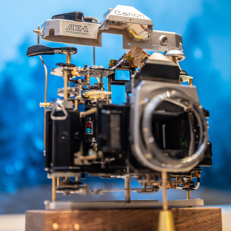 Disassembled Mechanical Film Canon AE-1 Camera , Home Decor, Camera Art