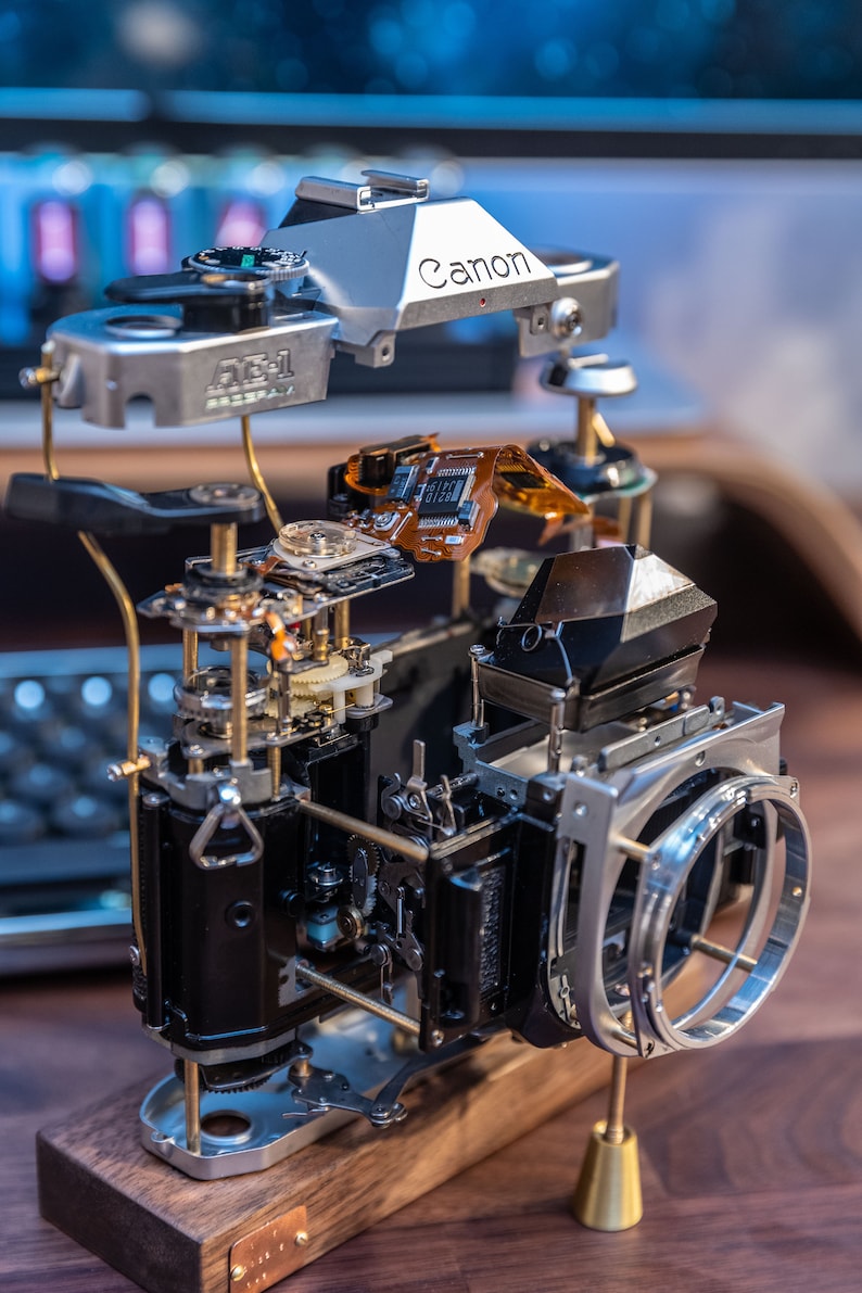 Disassembled Mechanical Film Canon AE-1 Camera , Home Decor, Camera Art